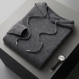 Glenn | MĒRĶU MĪKSTĀ UN ELEGANTĀ KAPUUTSWEATER